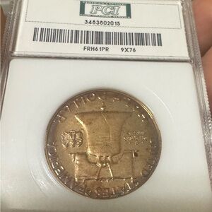 Gold Coin with Liberty Bell Design